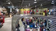 From the running track to the ‘pass and shoot’ area, the store is built around sporting experience