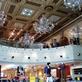 The Forever 21 store was previously a bank and boasts a dramatic mezzanine with multiple chandeliers for glitz