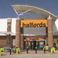 Halfords profits slump as £100m investment plan unveiled